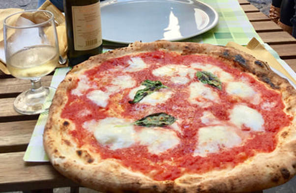 Miss Windsor: enjoys a Neapolitan Pizza upon her arrival in Naples, Italy!